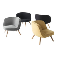 "Set of four chairs in gray, black, and mustard yellow with sleek, modern designs and wooden legs."