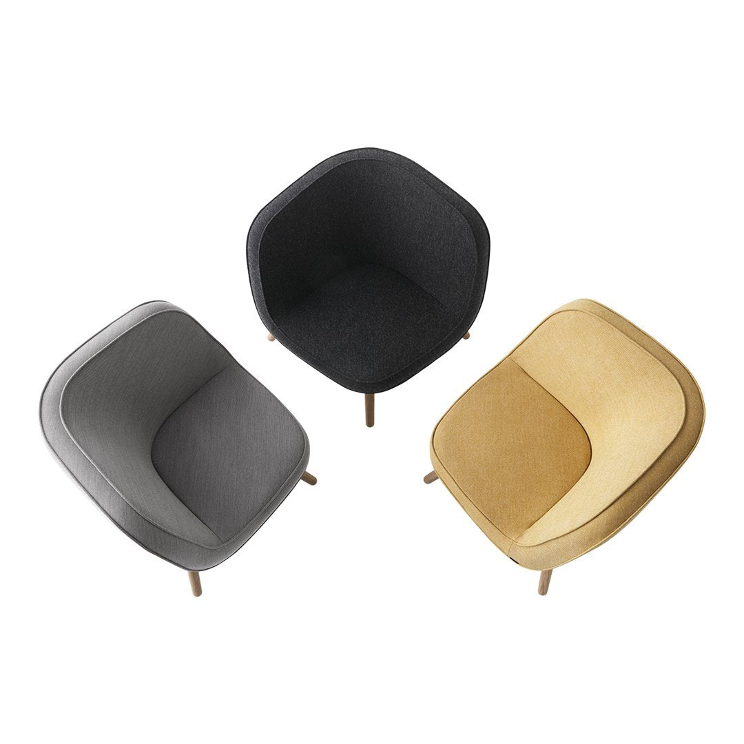 Modern chairs in gray and gold with smooth, curved designs and contrasting textures. Perfect for stylish interiors.