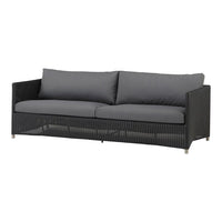 Modern outdoor sofa featuring a sleek black wicker design and dark gray cushions for a stylish look.