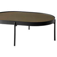 Black oval coffee table with a sleek dark brown glass top and minimalist design. Perfect for modern interiors.