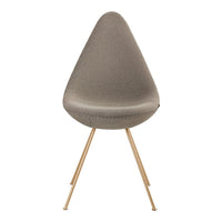Gray teardrop chair with a textured fabric seat and golden metal legs, offering a modern, minimalist look.