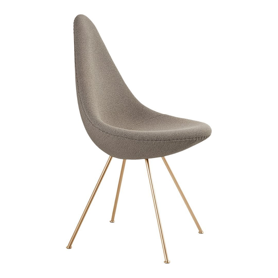 Gray upholstered chair with a sleek design and gold metal legs, featuring a smooth, minimalist pattern.