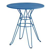 Round blue metal table with a minimalist design and wire base, perfect for indoor or outdoor use.