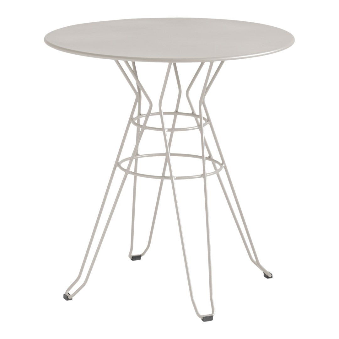 Round white table with a sleek, minimalist design featuring a geometric wire base. Perfect for modern decor.