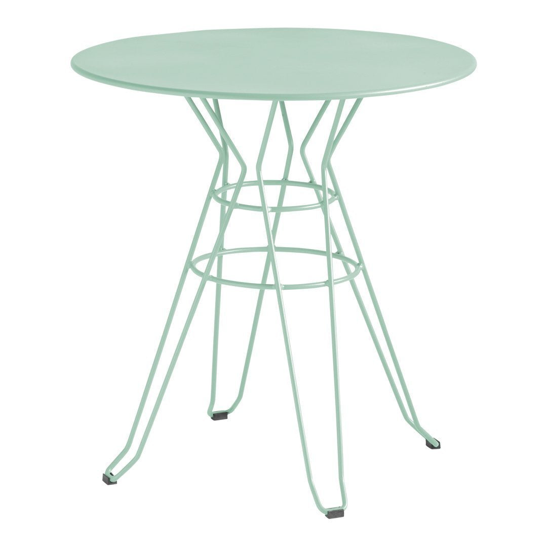 Mint green round table with a geometric wire base, adding a modern touch to any space.
