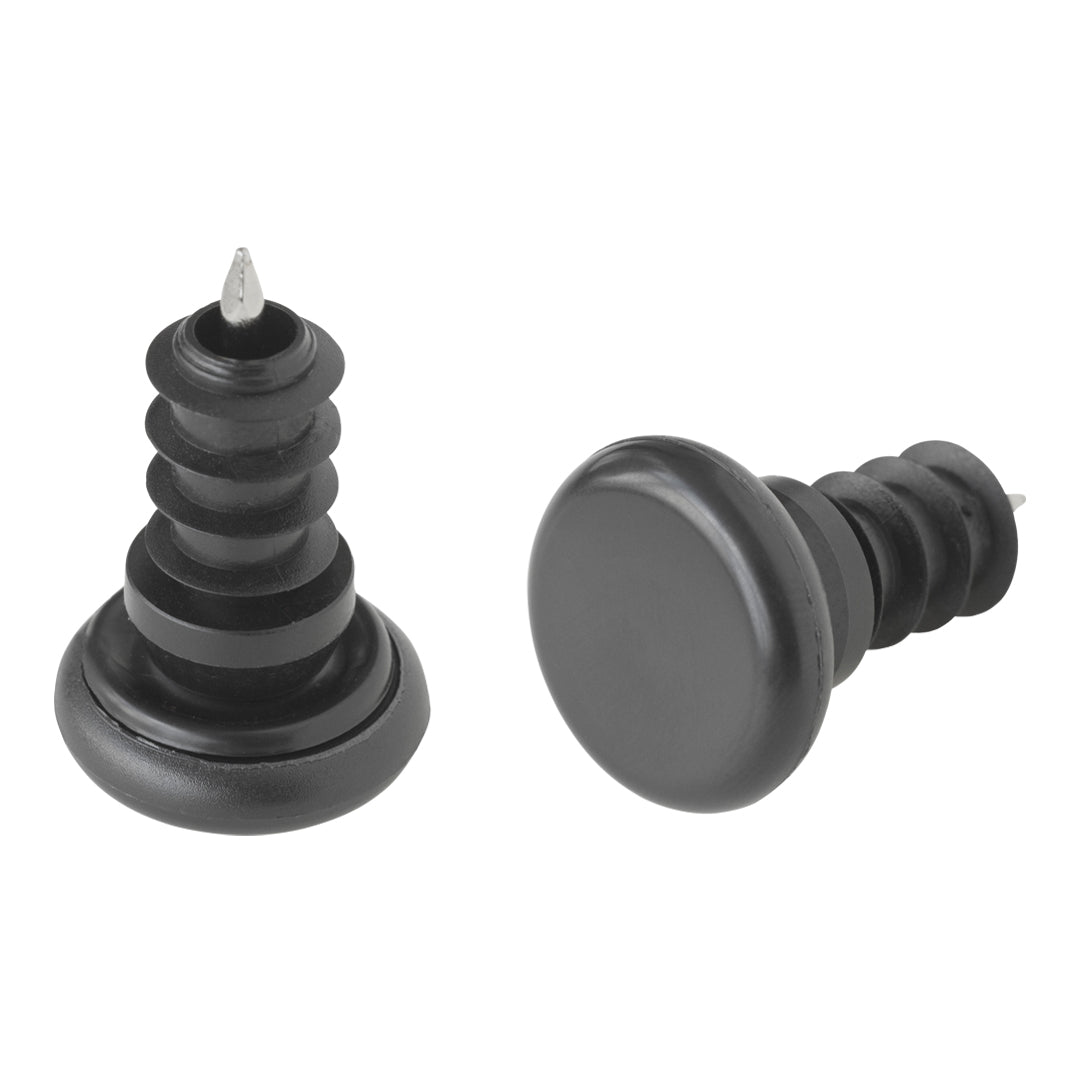 Black rubber stoppers with smooth and ribbed patterns, featuring a metal tip for added durability.