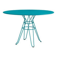 Teal oval table with a sleek wire base, featuring a modern design and vibrant color for stylish decor.