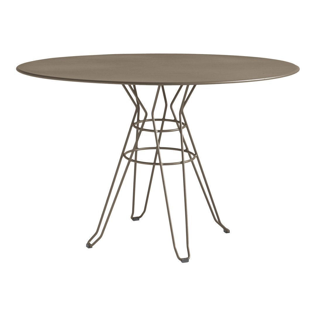 Oval gray tabletop with a distinctive wire base, featuring a minimalist design and neutral color palette.