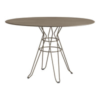 Oval gray tabletop with a distinctive wire base, featuring a minimalist design and neutral color palette.