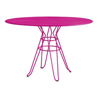Vibrant pink oval table with stylish wire legs, perfect for adding a pop of color to any space.