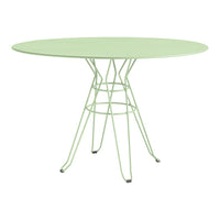Oval green table with a sleek wireframe base, ideal for modern outdoor or indoor settings.