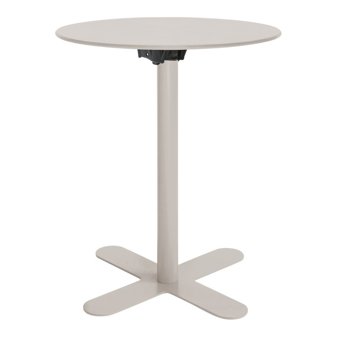 Round beige table with a smooth surface and sturdy cross-shaped base, perfect for modern decor.