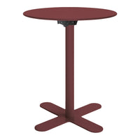 Round burgundy table with a sleek design and cross-shaped base, perfect for modern dining or outdoor settings.