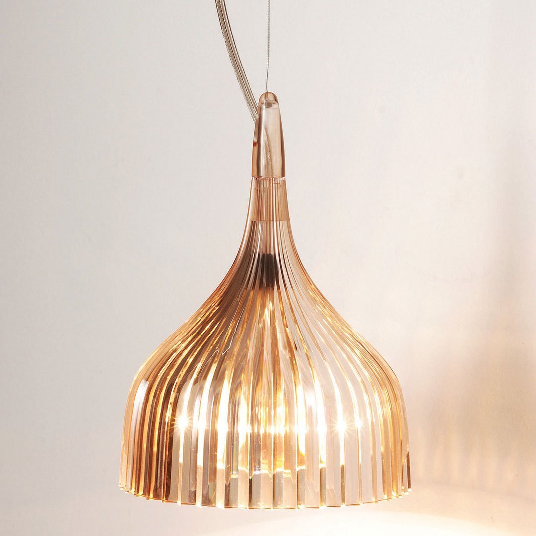 Gold striped pendant lamp with a sleek, modern design, casting a warm glow for stylish ambiance.