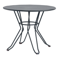 Round black metal table with sleek, wire legs, featuring a minimalist design and smooth, solid surface.