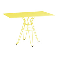 Bright yellow rectangular table with modern wire base, perfect for adding a pop of color to any space.