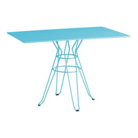 A stylish rectangular table with a bright turquoise top and light blue wire base, showcasing modern design.