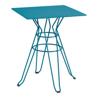 Teal metal table with a geometric wire base, featuring a smooth square top and modern design.