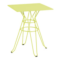 Bright lime green square table with a geometric wire base, adding a modern touch to any space.