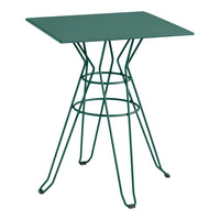 Green square top table with a geometric wire base, perfect for modern decor.