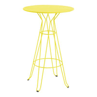 Bright yellow round table with a modern wireframe design, perfect for adding a pop of color to any space.
