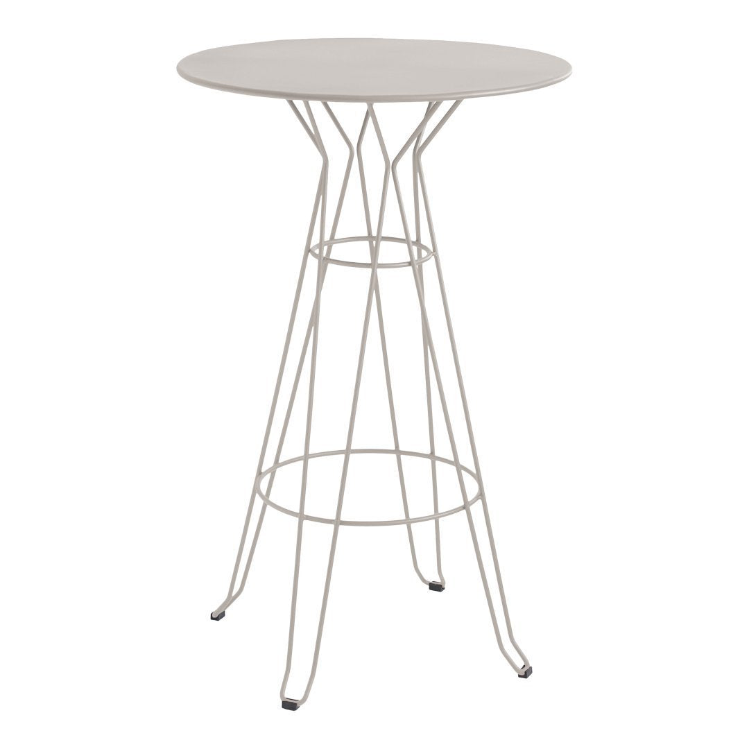 Tall round bar table in sleek white with a minimalist wire base, perfect for modern decor.