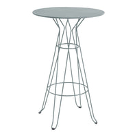 Round light blue table with a minimalist wire base, featuring a sleek, modern design and smooth finish.