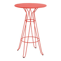 Red round table with a modern wire-frame design, featuring sleek lines and a vibrant finish.