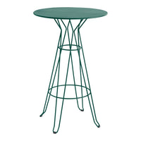 Green metal bar table with a round top and geometric wire base, perfect for modern outdoor or indoor spaces.