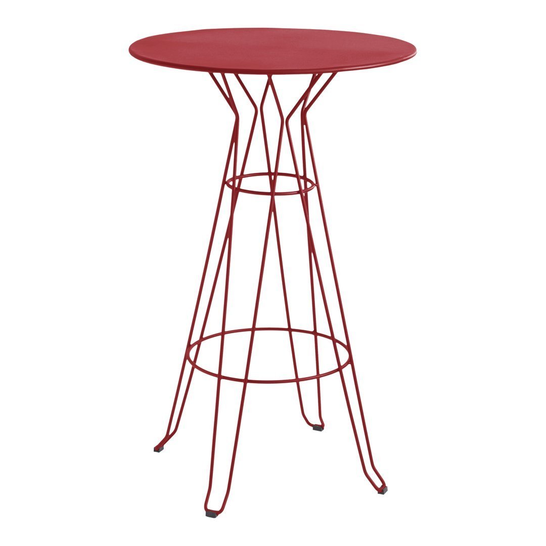 Red metal bar table with a sleek round top and modern wire base, perfect for contemporary decor.