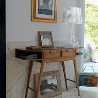 Mid-century wooden console table with natural finish, featuring two drawers and elegant tapered legs against a neutral backdrop.