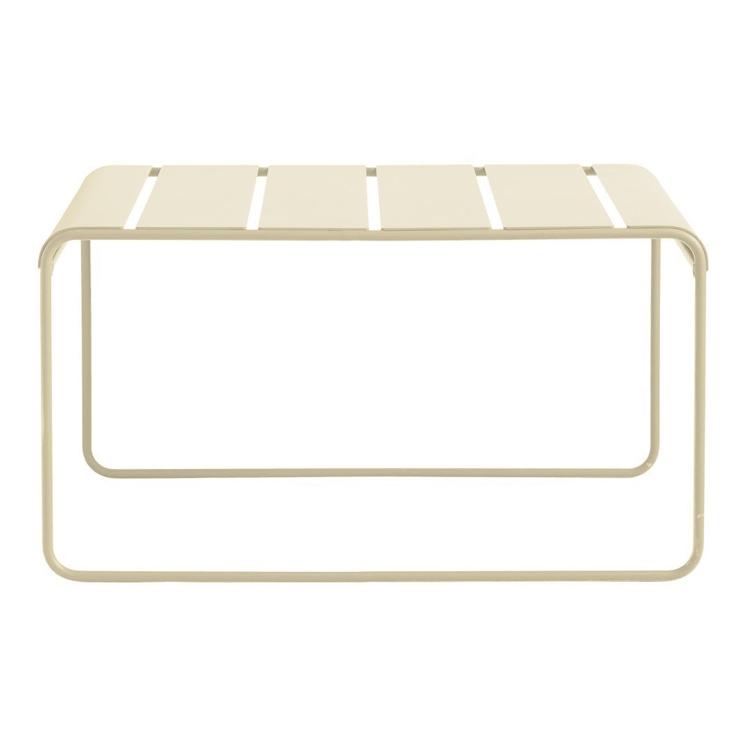 Light beige metal table with a sleek, slatted top and minimalist design, perfect for modern decor.