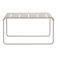 Light gray metal coffee table with slatted surface and minimalistic design. Perfect for modern interiors.