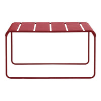 Red metal coffee table with sleek slatted design and minimalist frame. Ideal for modern outdoor or indoor decor.