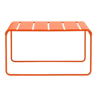 Bright orange metal coffee table with sleek slatted design and minimalist frame. Perfect for modern spaces.