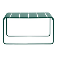 Green metal coffee table with slatted design, featuring a sleek modern finish and minimalistic aesthetic.