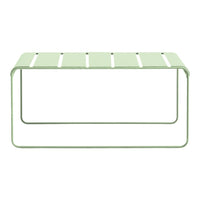 Light green metal coffee table with striped pattern, minimalistic design, perfect for modern home decor.