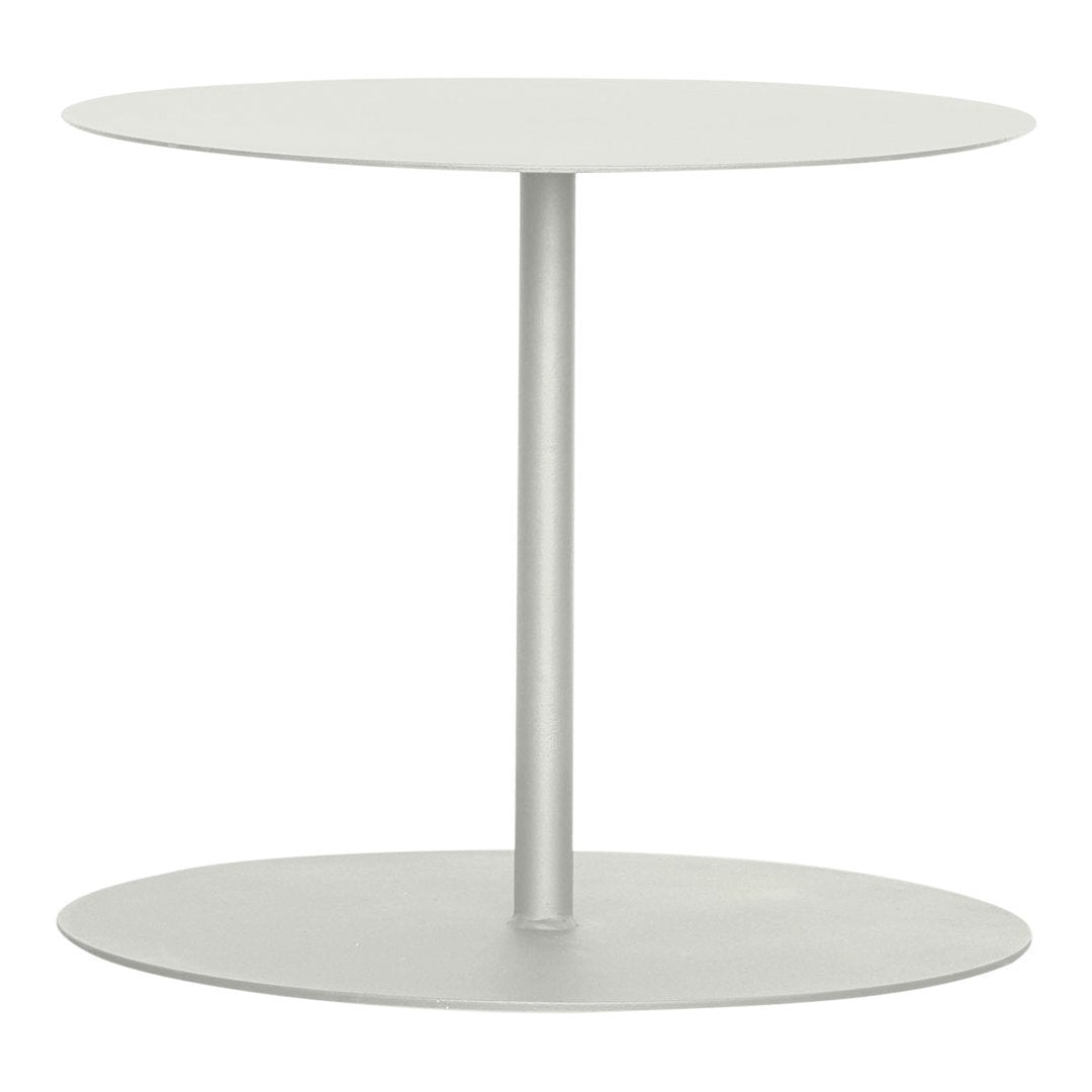 Minimalist round side table in soft gray finish with smooth, sleek surfaces. Ideal for modern decor.