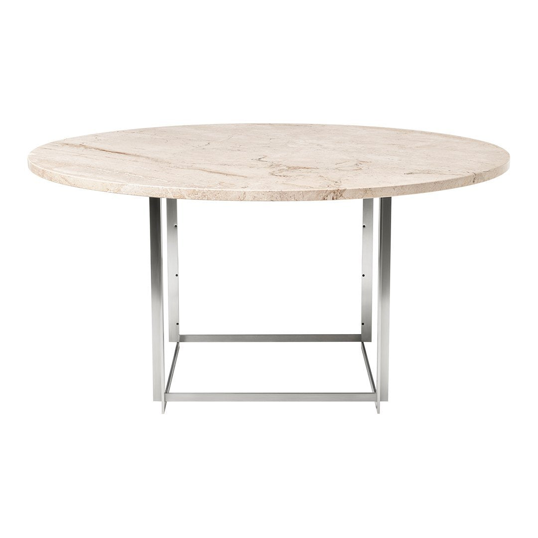 Round beige marble dining table with subtle veining and a modern silver metal base. Perfect for elegant dining spaces.