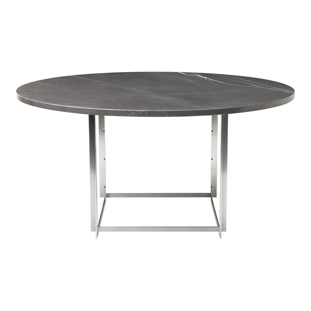 Round black marble dining table with subtle white veining and a sleek silver metal base. Perfect for modern decor.