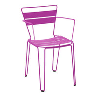 Vibrant pink metal chair with sleek striped pattern and modern design, perfect for outdoor or indoor decor.