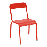 Red metal chair with a simple, minimalist design and smooth finish. Perfect for modern interiors.