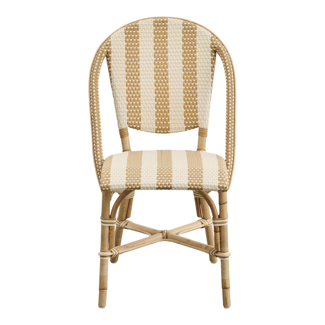 Striped beige and cream chair with natural bamboo frame, perfect for a chic outdoor or indoor dining setup.
