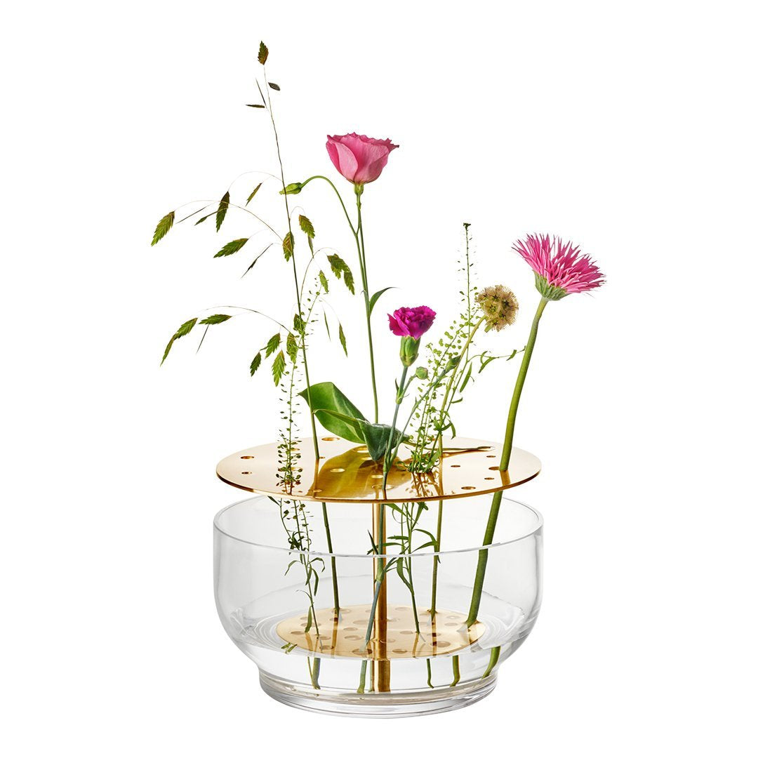 Clear glass vase featuring gold accents, with a mix of pink and green floral arrangements. Perfect for modern decor.