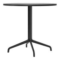 Round black table with a sleek design and a minimalistic black metal base. Perfect for modern interiors.