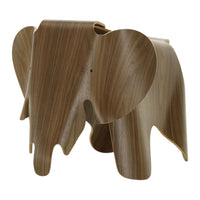 Wooden elephant sculpture in rich brown tones with smooth, flowing patterns. Perfect for modern decor.