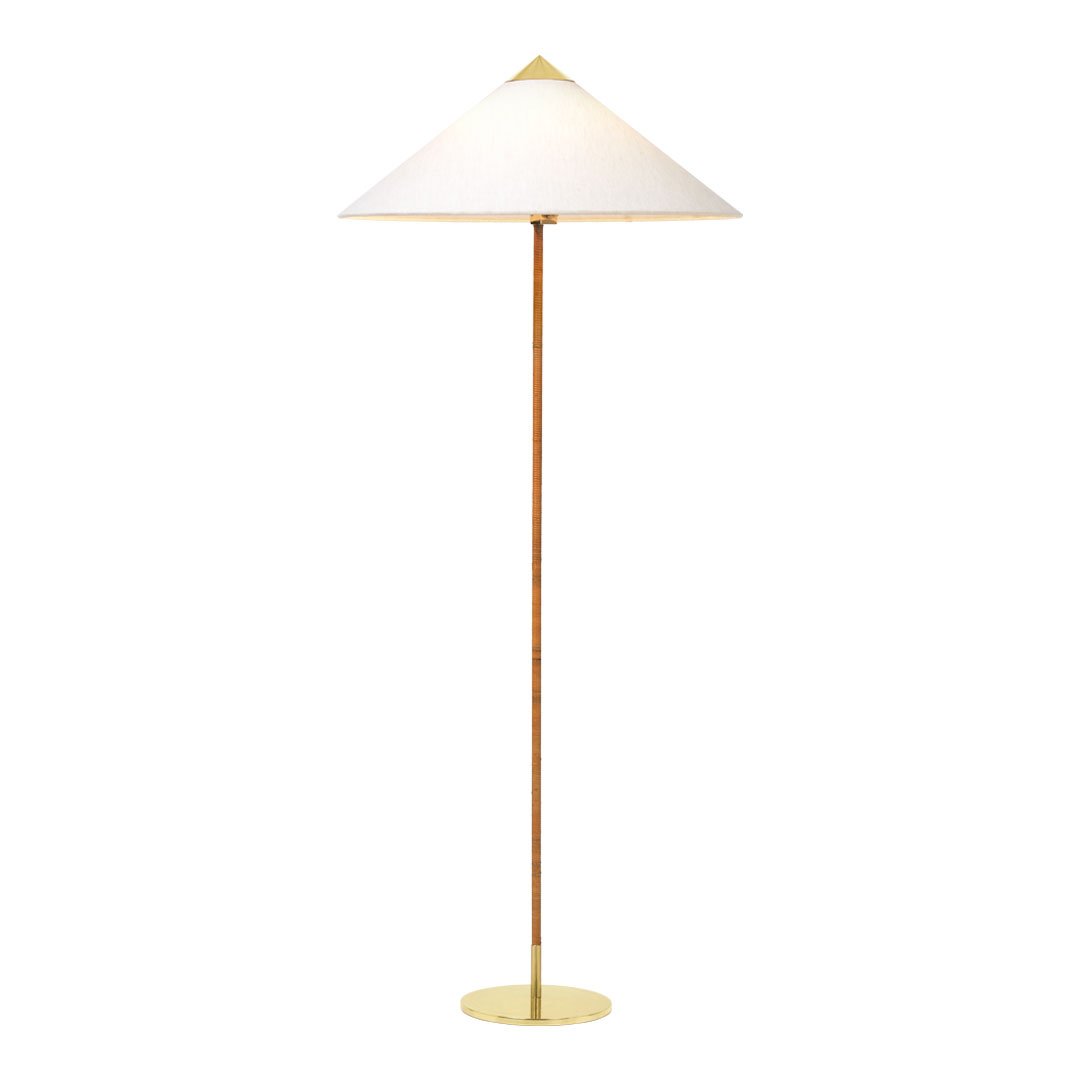 Elegant white lampshade with gold accents on a slender, gold-tone metal base, featuring a minimalist design.