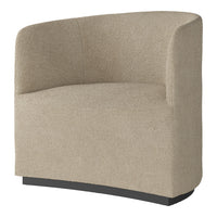 Beige textured armchair with a smooth curved design and contrasting black base. Ideal for modern interiors.