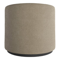 Round beige ottoman with a soft textured finish and a sleek black base. Ideal for modern decor.