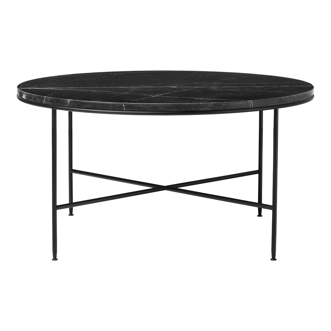Round black marble table with sleek black metal legs and a minimalist design. Ideal for modern decor.